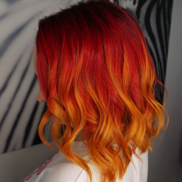 Flame-like colored Lob Cut with Soft Waves Hairstyle