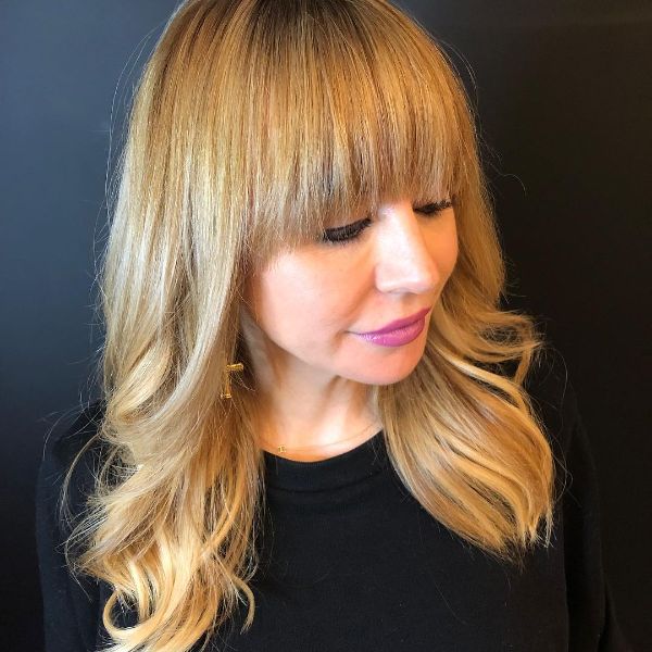 Soft Curls for Long Layered Blonde Hair with Blunt Bangs