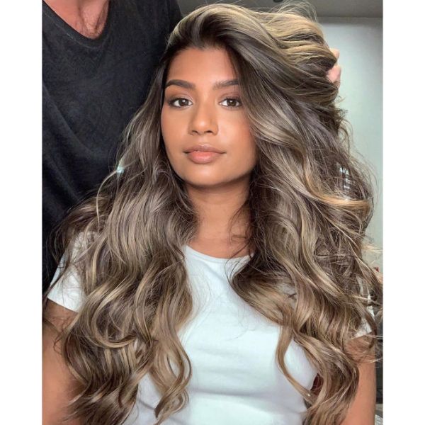 Voluminous Layers for Wavy Hair with Side Part