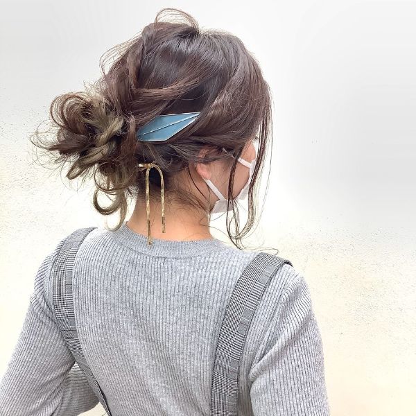 Messy Bun with Massive Hair Accessory