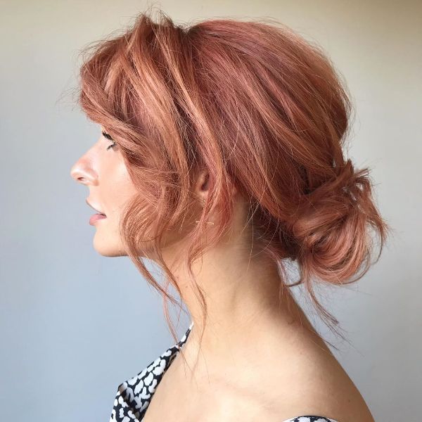Messy Low Bun for Strawberry Pink Hair with Bangs