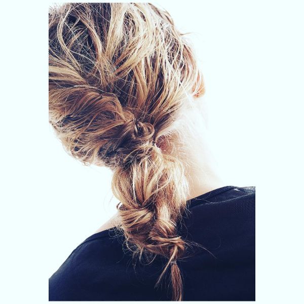 Messy Updo for Long Hair with Twisted Ponytail and Knots