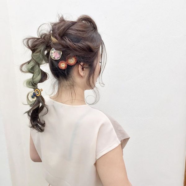 Messy Updo with High Twisted Ponytail and Accesorries for Long Hair