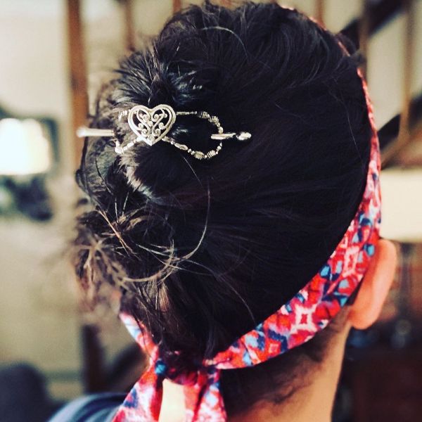 Pin-up Inspired Messy Updo with Hair Clip and Headband