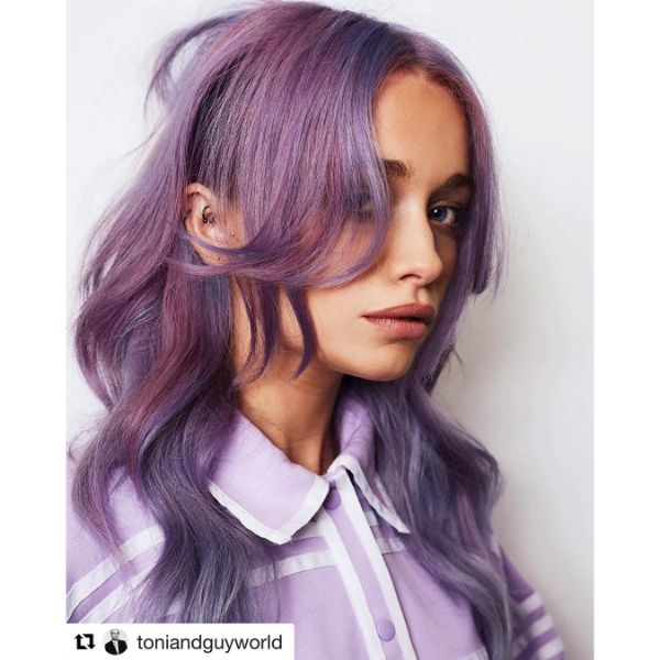 Purple Wavy Long Layered Hairstyle with Winged Bangs