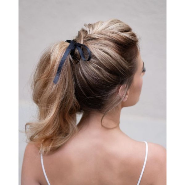 Romantic Messy Updo with Ponytail and Satin Ribbon for Long Hair