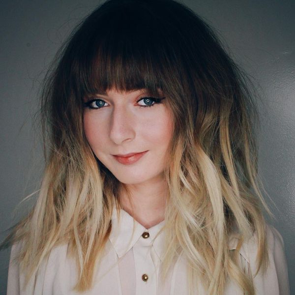 Shaggy Layered Hairstyle with Heavy Bangs for Ombre Hair