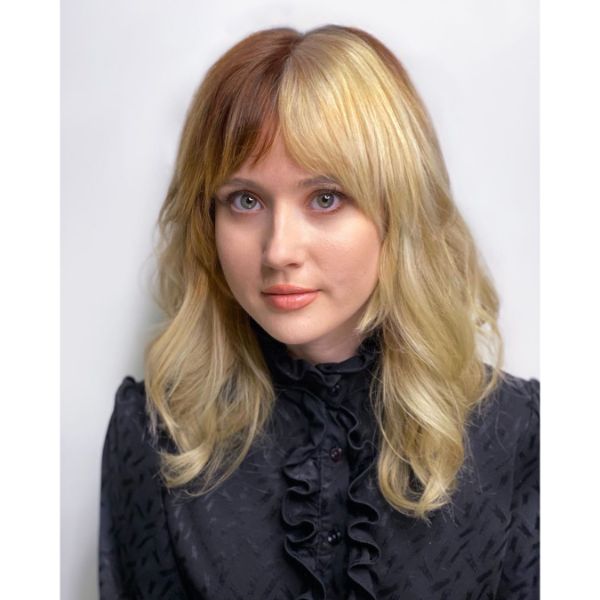 Two-toned Blonde Layered Hairstyle with Wavy Bangs 