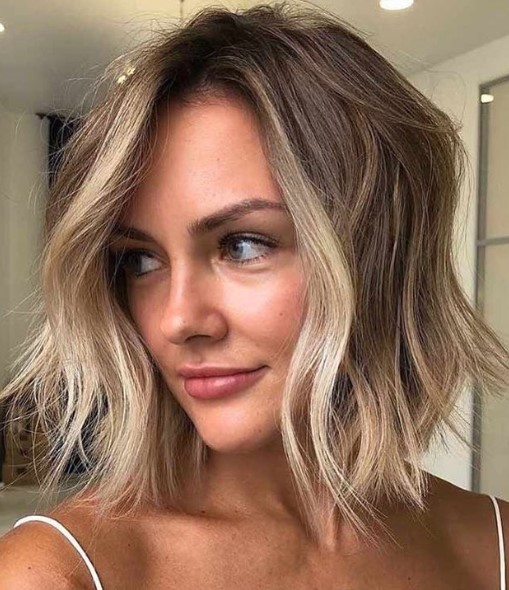 Wavy Lob with Blonde Highlights
