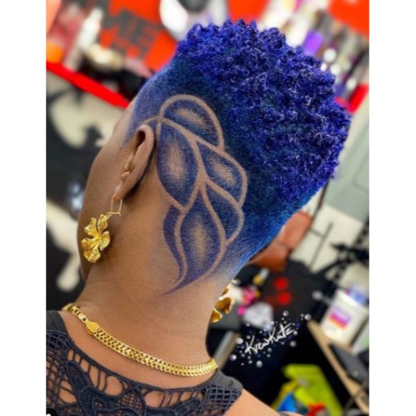 a woman with Indigo Blue High Taper with Leaf Design