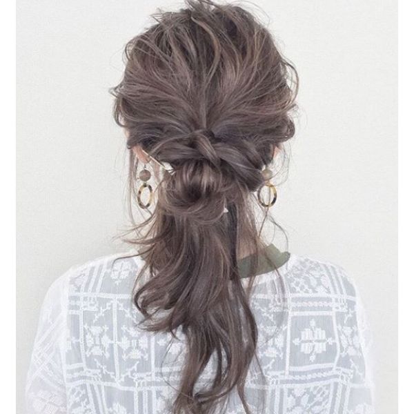 Knotted Ponytail with Messy Strand