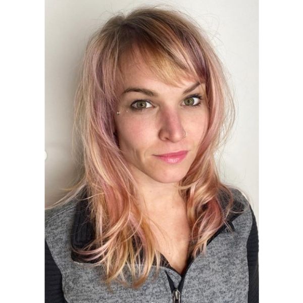 Medium Length Pastel Hairstyle with Straight Bangs
