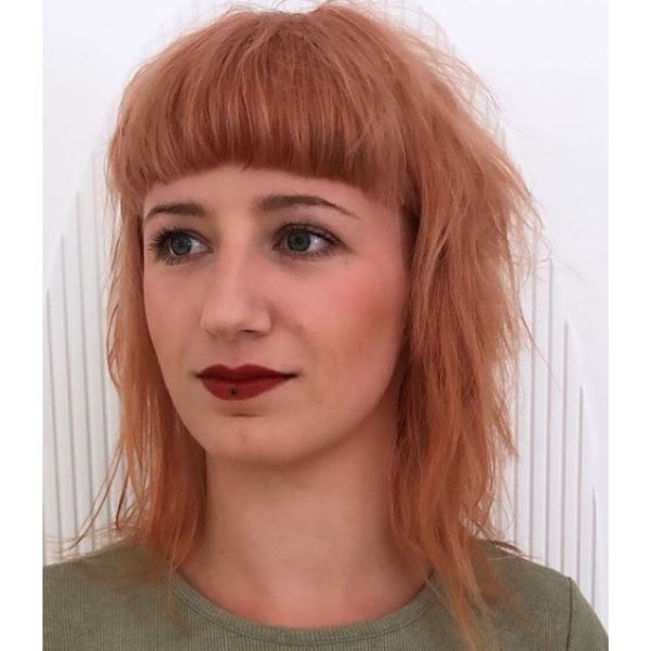 Peach Mullet Hairstyle with Straight Bangs Mid Length Hairstyle