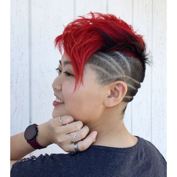 Punk Mohawk with Shaved Sides and Artistic Razor Pattern
