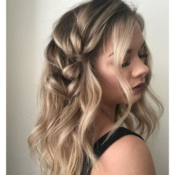Long Curly Feathered Hairstyle with Accent Braid