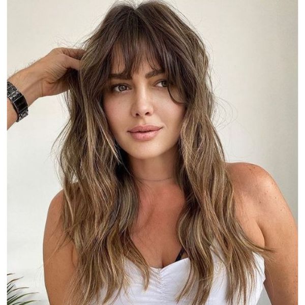  Sunkissed Balayage for Long Shag Hairstyle with Thick Bangs