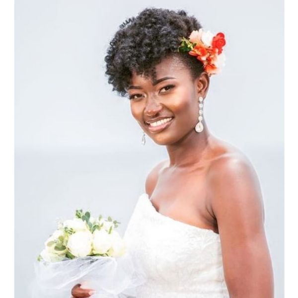 Afro Wedding Hairstyle For Faux Hawk With Colorful Flower