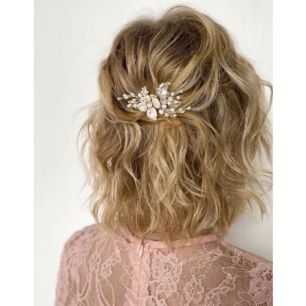 Blonde Messy Half Updo With Flower Pin For Medium Hair