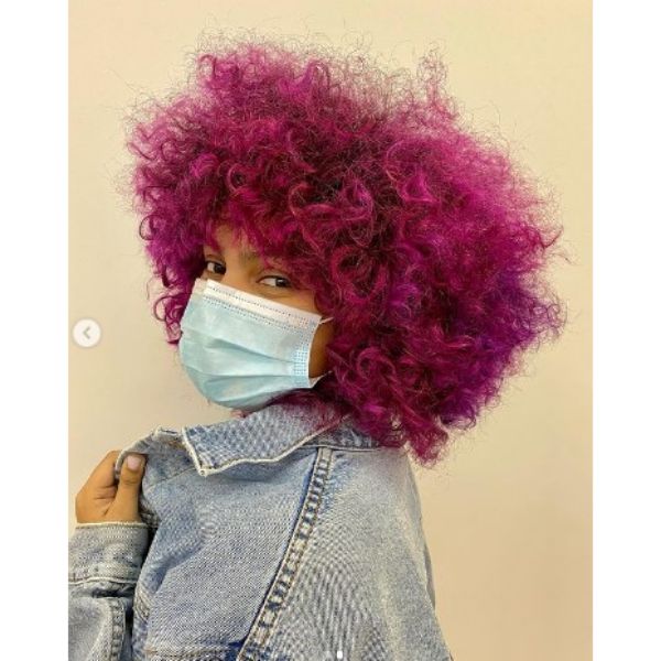 Bright Magenta Short Curly Hairstyle