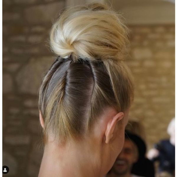 High Blonde Bun With Twisted Strands