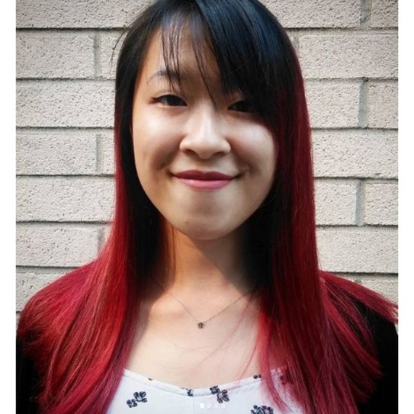 Long Straight Red Hair With Dark Bangs Hairstyle