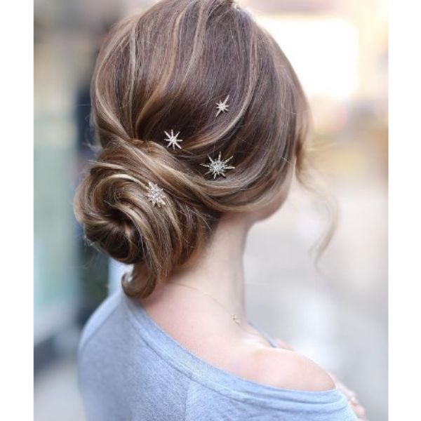  Low Swirly Bun Hairstyle For Medium Hair With Star Pins