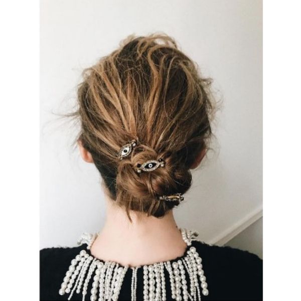 Messy Knotted Bun Hairstyle For Blonde Hair With Vintage Hair Pins