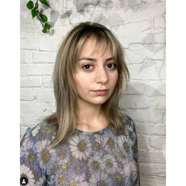 Shaggy Layered Cut With Straight Bangs For Thin Hair