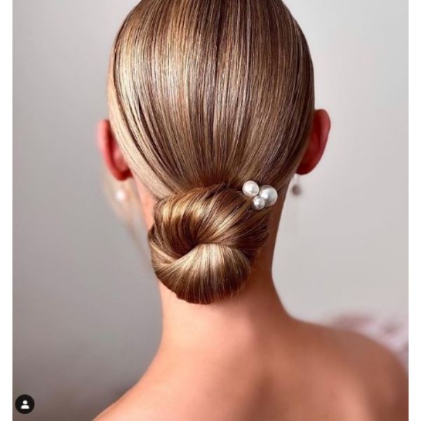 Sleek Knotted Low Bun With Pearl Pins