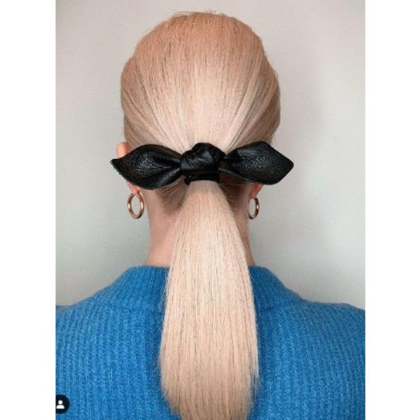  Sleek Straight Low Ponytail With Ribbon Hairstyle