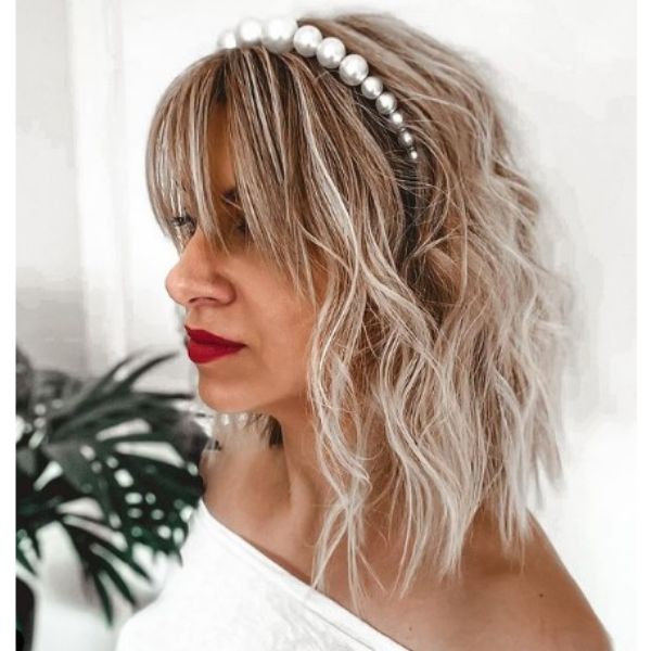 Undone Textured Wedding Hairstyle With Straight Bangs