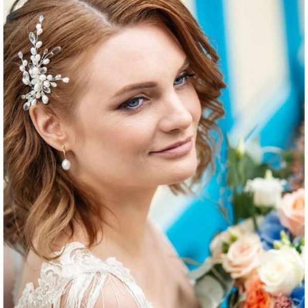 Wavy Wedding Hairstyles For Red Medium Hair With Flower Pin