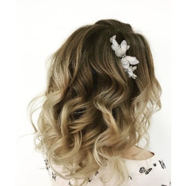 Wedding Hairstyles For Medium Wavy Hair With Flower Pin And Soft Waves