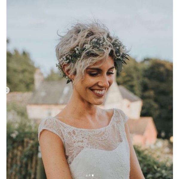 a woman with Ashy Blonde Messy Pixie With Floral Headband