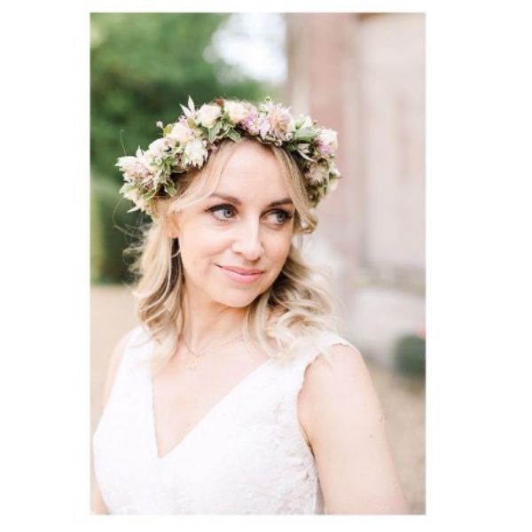 a woman with Light Blonde Wavy Bob With Flower Crown