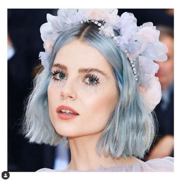 a woman with Short Ice Blue With Floral Headband