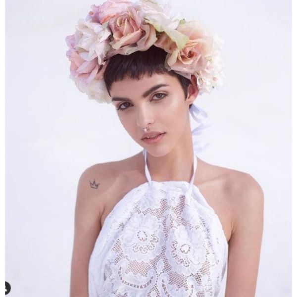 a woman with Short Pixie With Roses Flower Crown