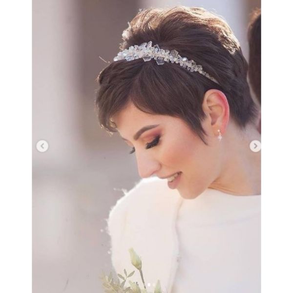 a woman with Short Textured Pixie Hairstyle With Crystal Headband
