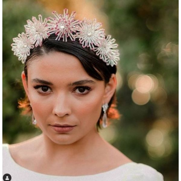 a woman in Simple Hairstyle With Stunning Headpiece