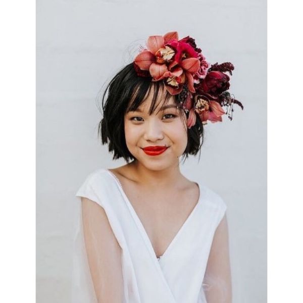 a woman with Chopped Bob Hairstyle And Flower Crown in white dress