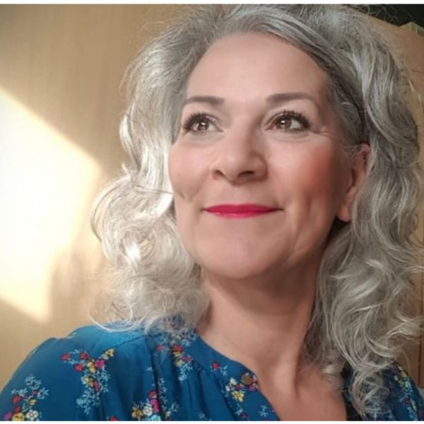 Curly Silver Grey Medium Long Hairstyle For Older Women