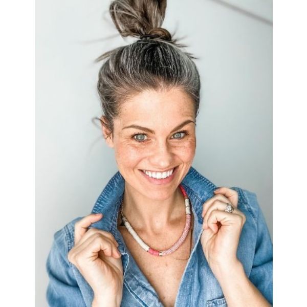  High Top Knot Medium Hairstyle With Silver Gray Strands