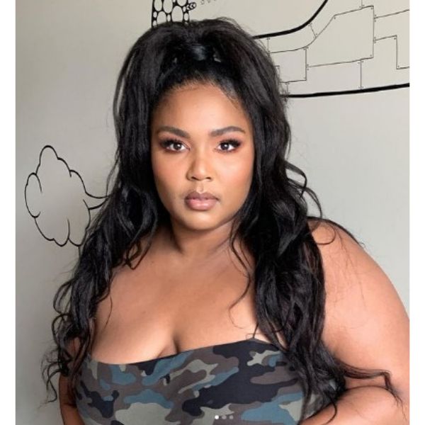 High Wavy Ponytail Lizzo Hairstyle For Black Hair