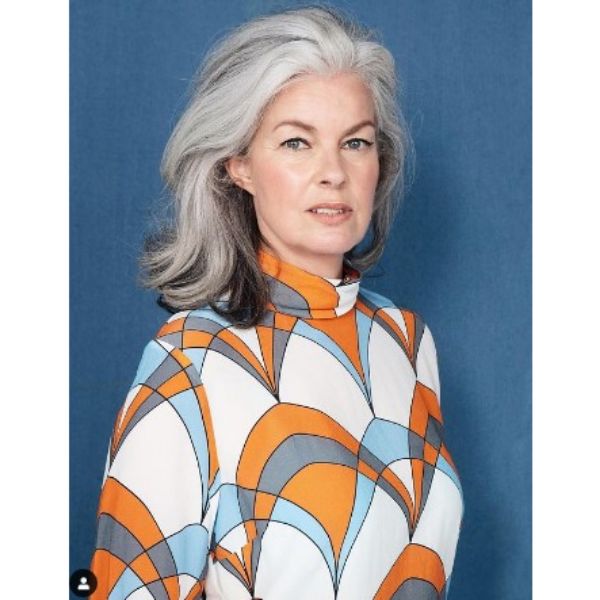 Silver Gray Medium Long Wavy Hairstyle For Older Women