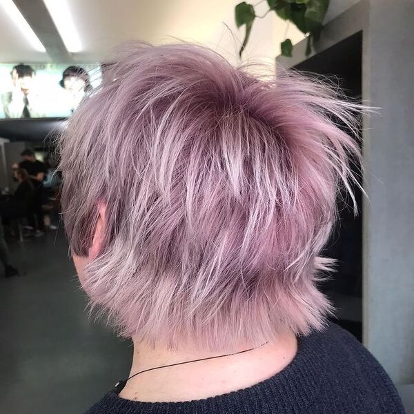 Rock Purple Dusty Short Shag Hair - A woman inside a salon