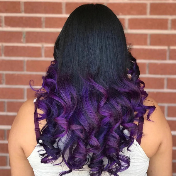Deep Purple and Black with Weighty Curls - a woman in a back view