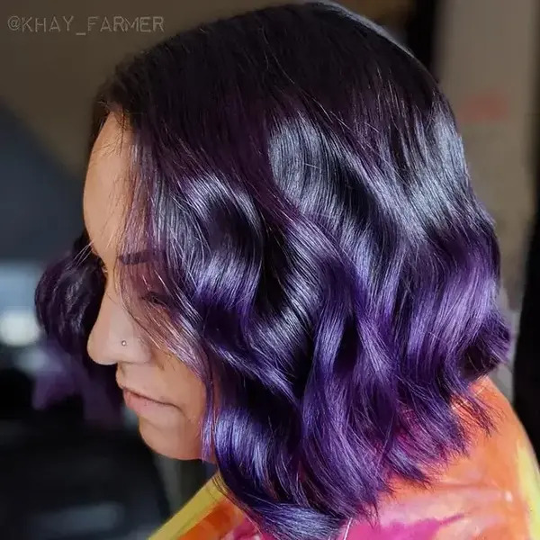 Gatsby Black Purplish Hairstyle - a woman in a side view