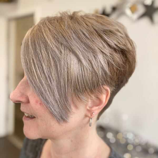 Modified Pixie Cut and Silver Foils - a woman in a side view