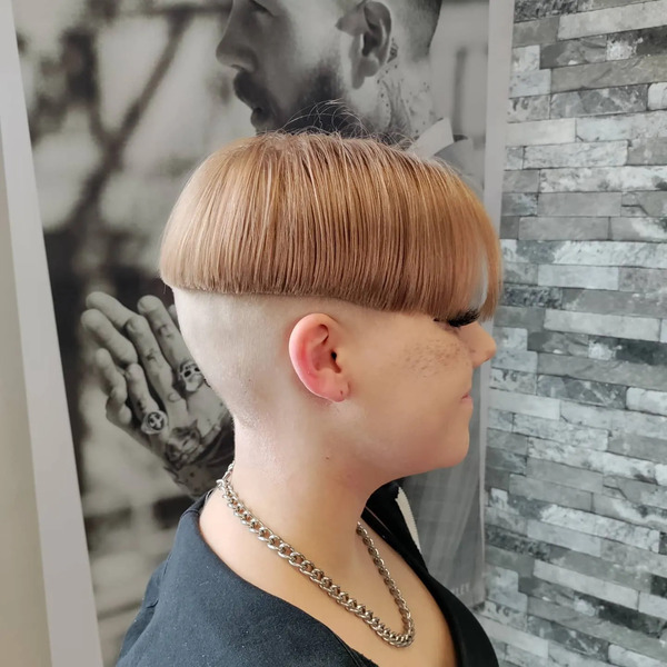 Mushroom Cut with Skin Shaved - a woman in a side view