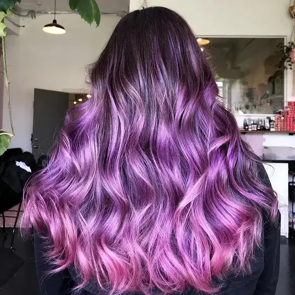 Muted Mauve and Dusty Rose Hairstyle - a woman in a back view